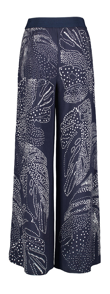 Pantalon large bleu foncé à imprimé blanc Caroline Biss