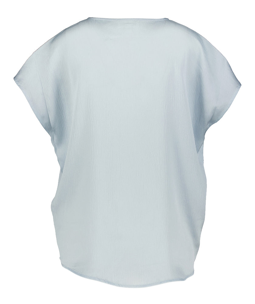 Chemisier bleu clair imprégné de luxe