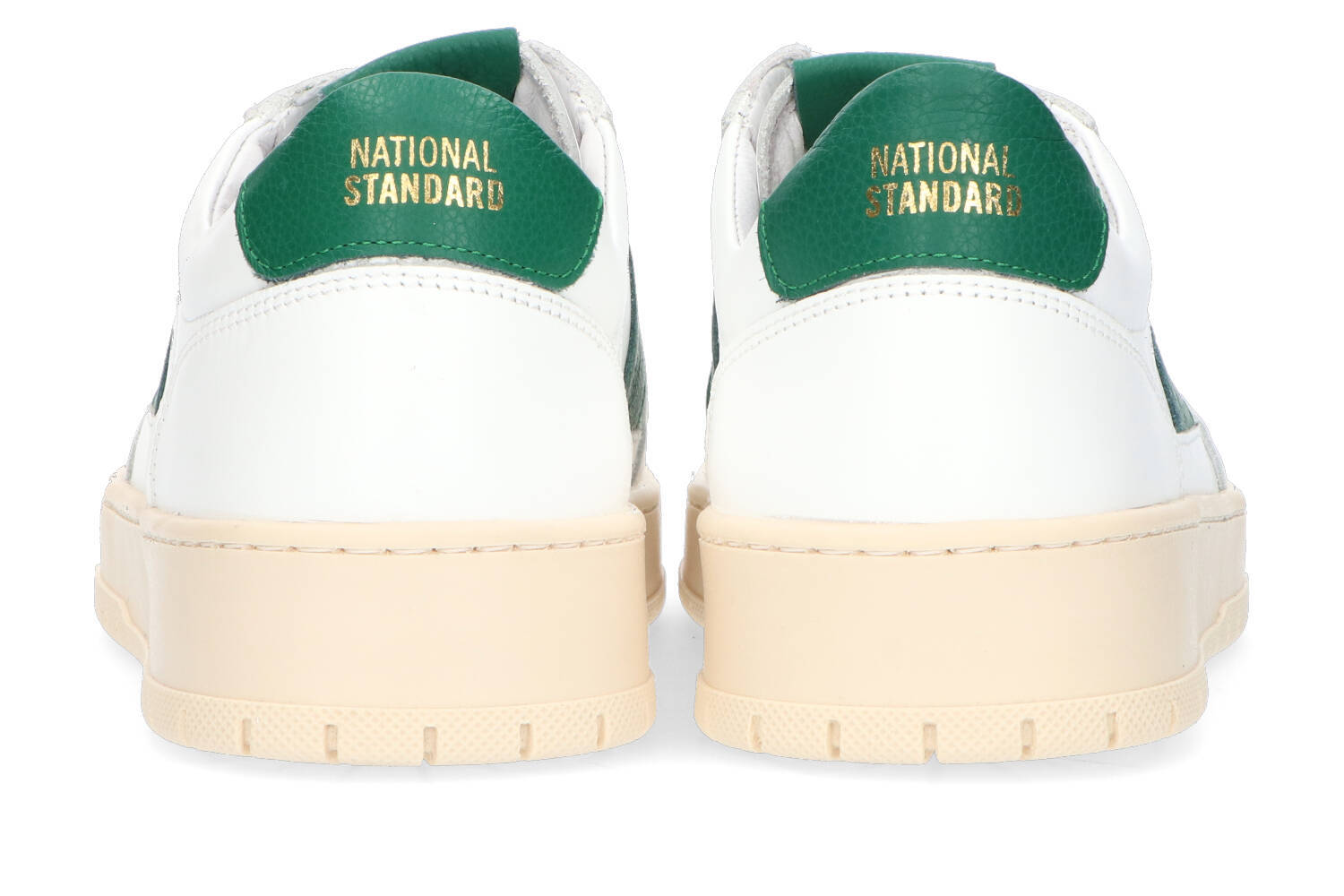 Wite lage sneakers met groene details National Standard