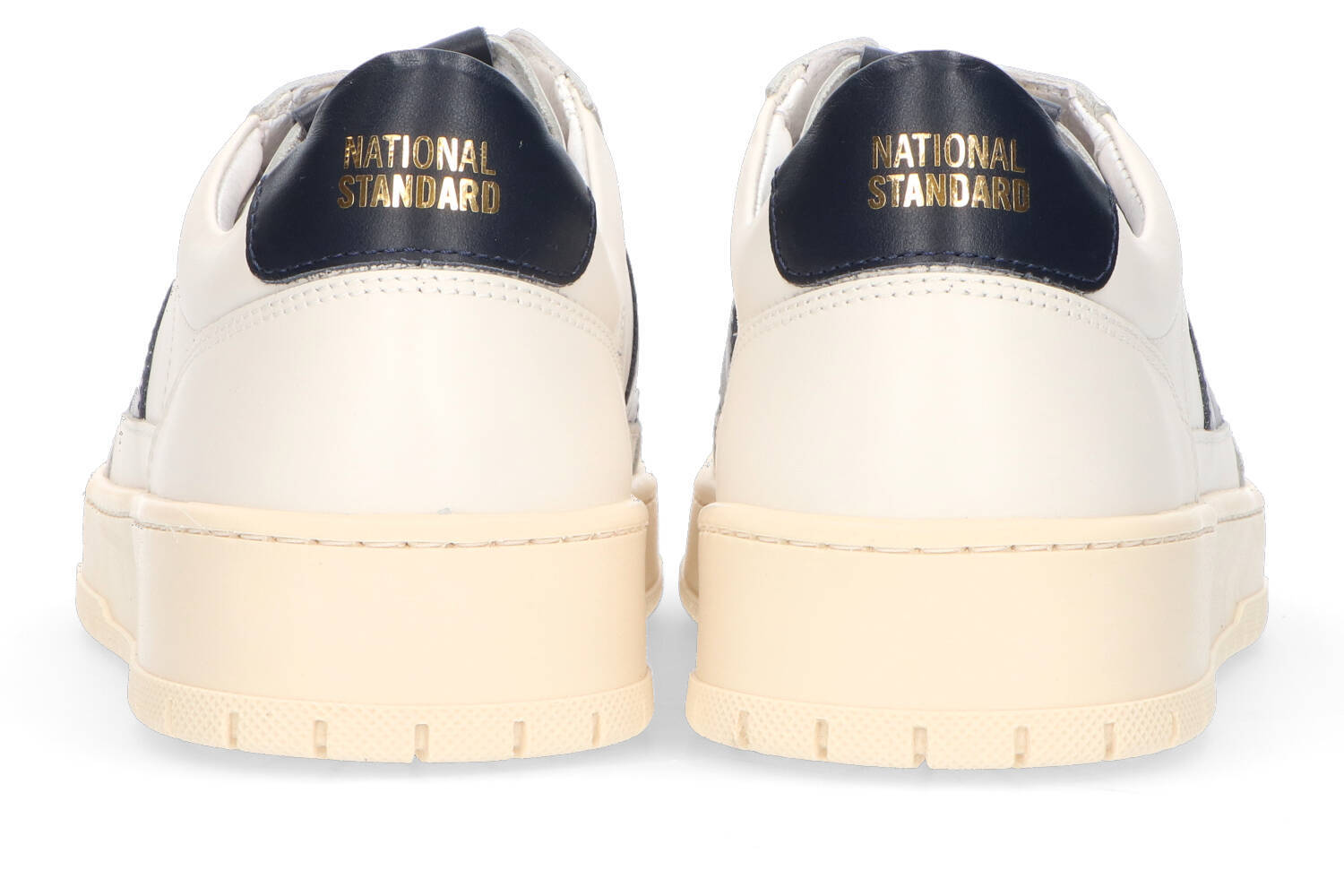 Greige lage sneakers met zwarte details National Standard