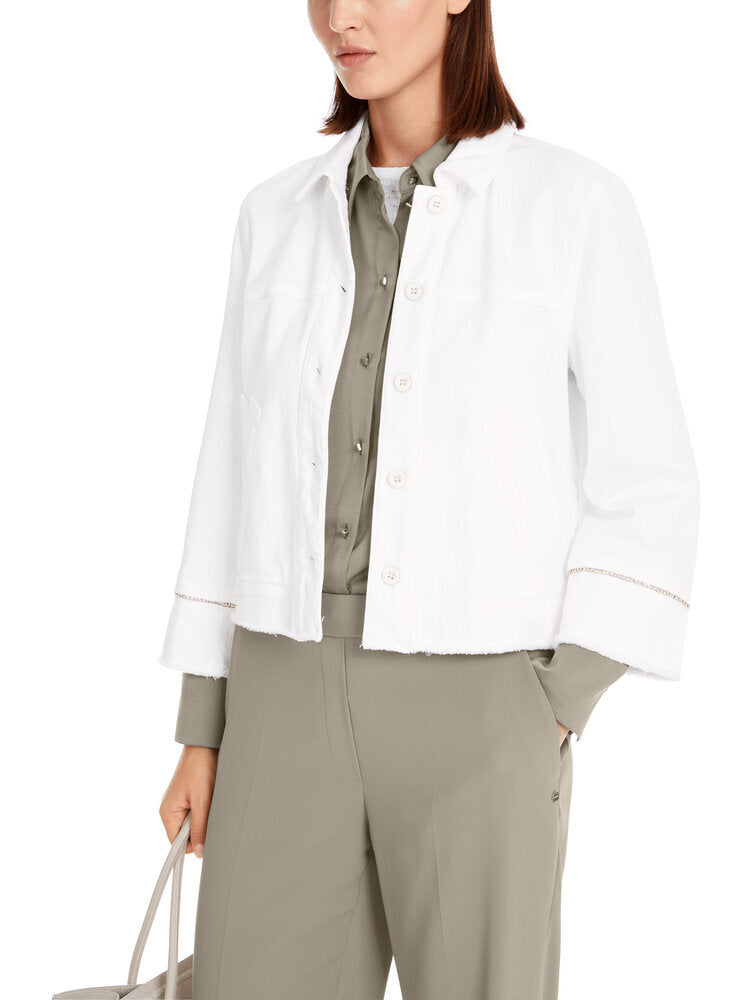 Veste en jean blanc à ourlet effiloché, collections Marc Cain