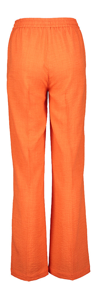 Pantalon orange à pli sur le devant Elle