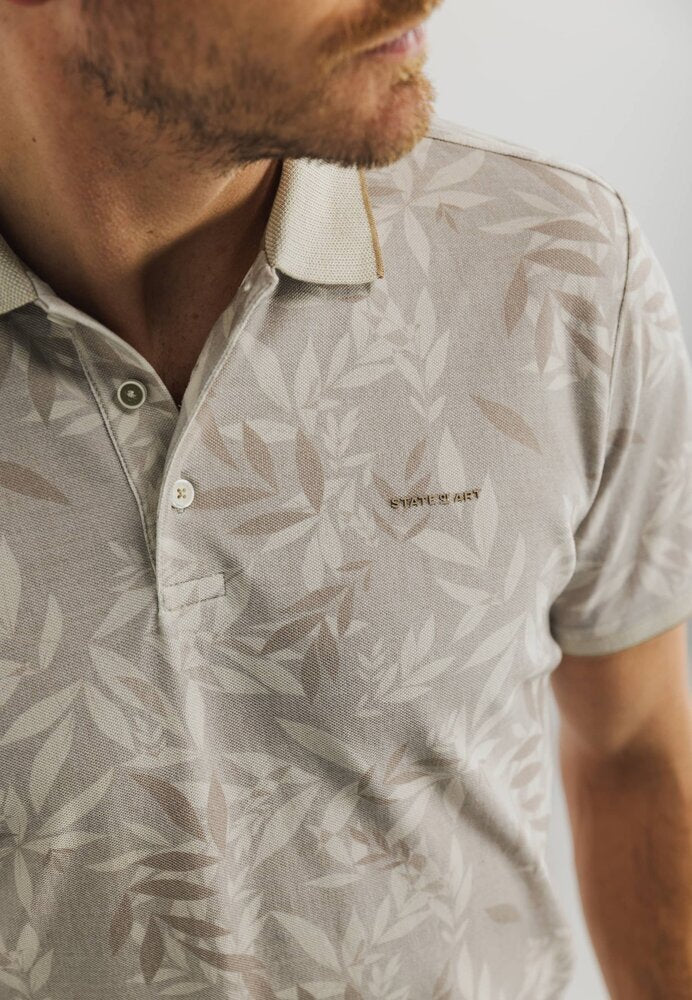 Polo beige avec imprimé de pointe