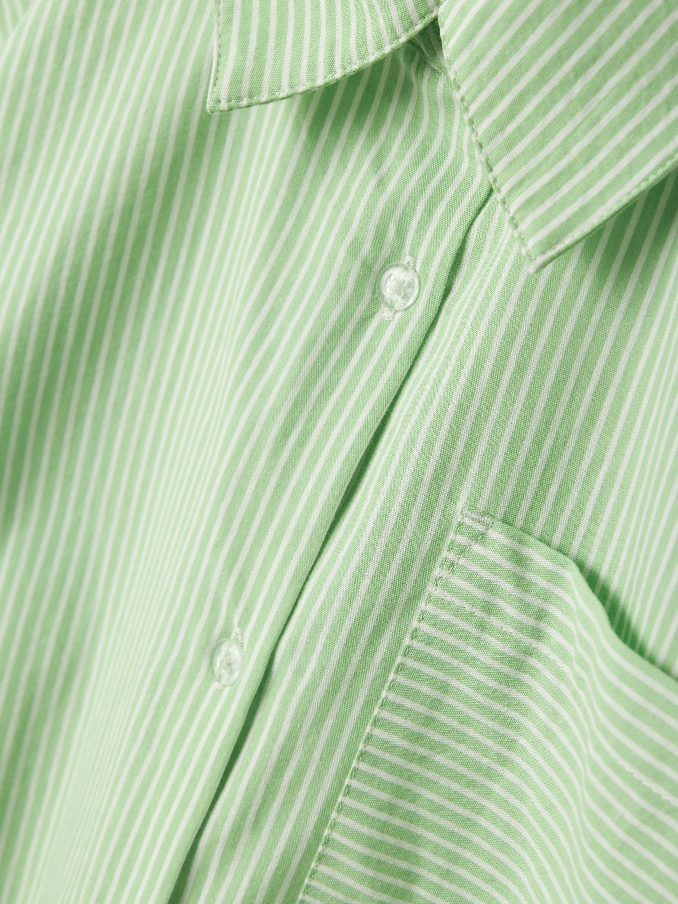 Lichtgroene en witte gestreepte blouse Name It