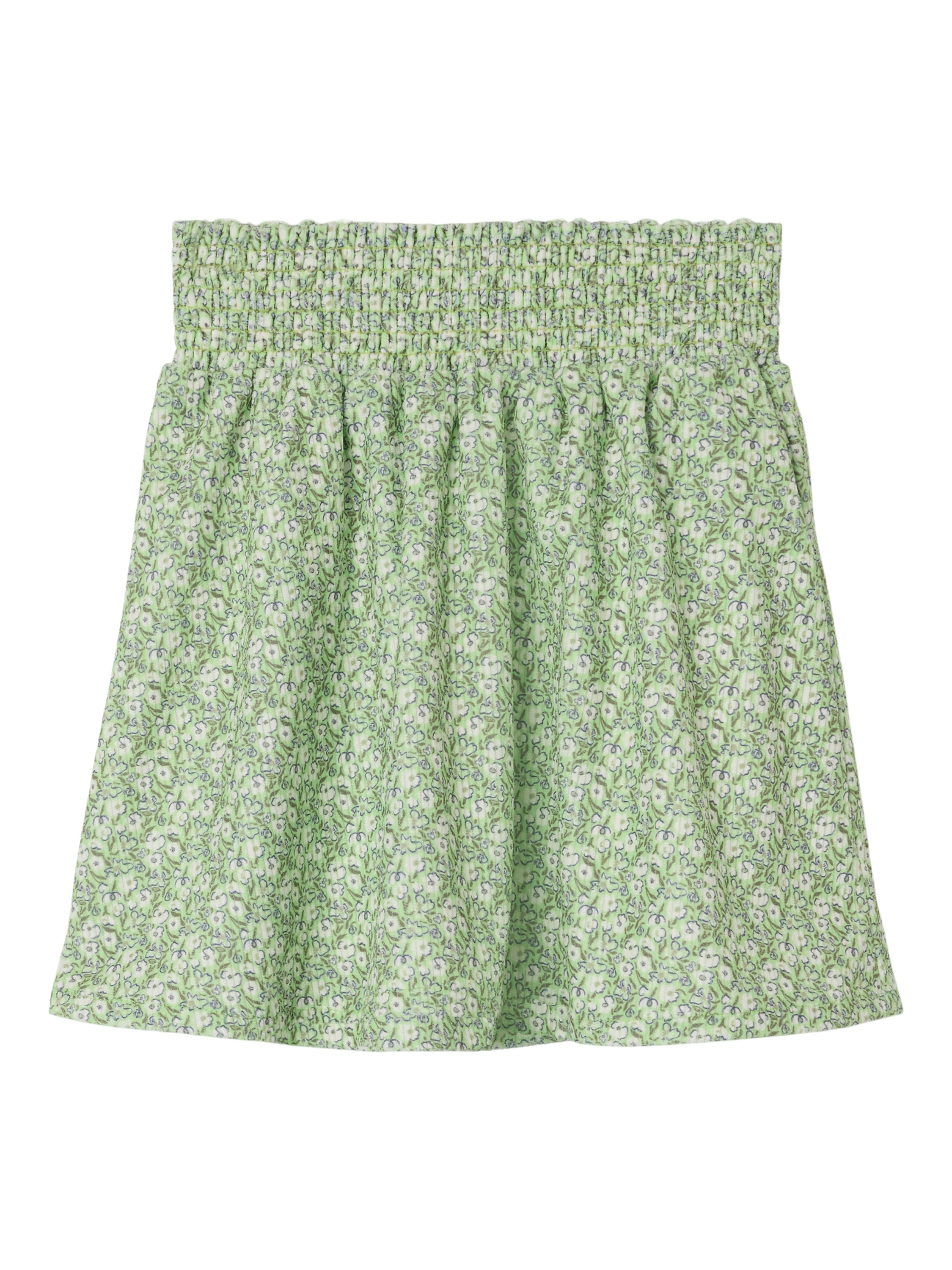 Jupe courte verte à motifs floraux. Nommez-la