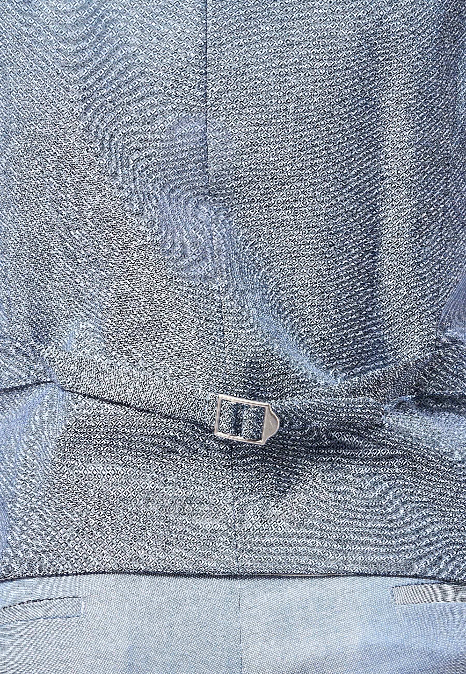 Roy Robson en gilet bleu