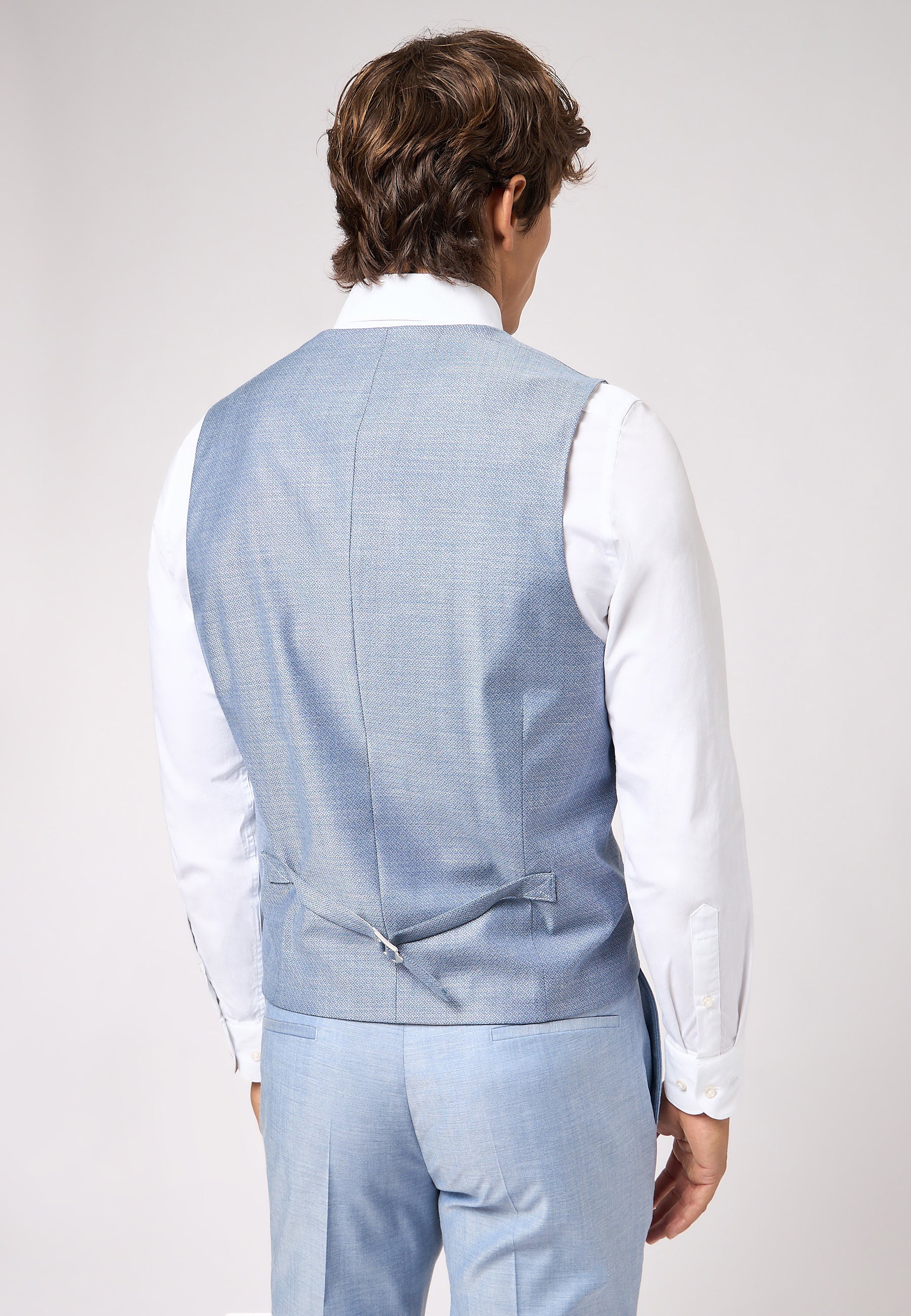 Roy Robson en gilet bleu