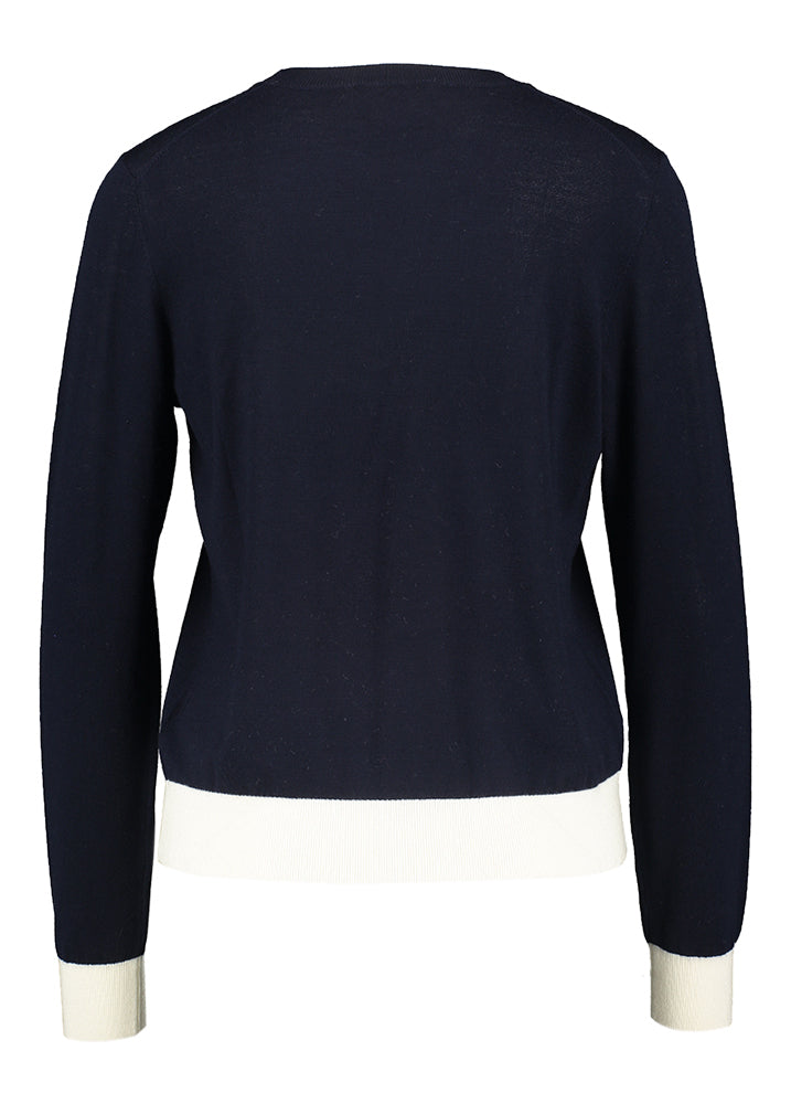 Pull en laine bleu foncé à bordure blanche de Future