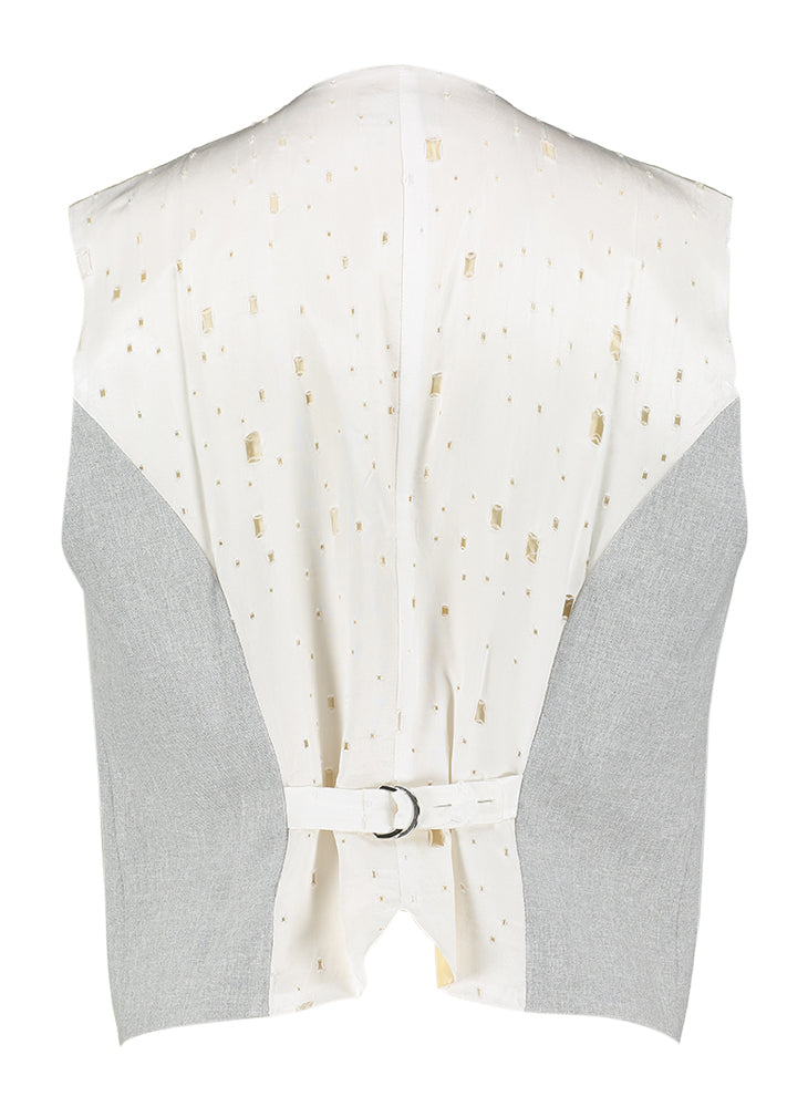 Lichtgrijze gilet met knopen en ecru detail op de achterkant Stella Nova