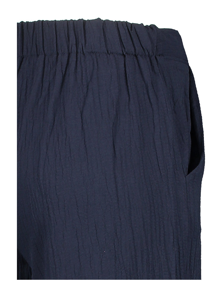 Pantalon bleu foncé à la coupe souple et structurée, avec élastique, Signe Nature