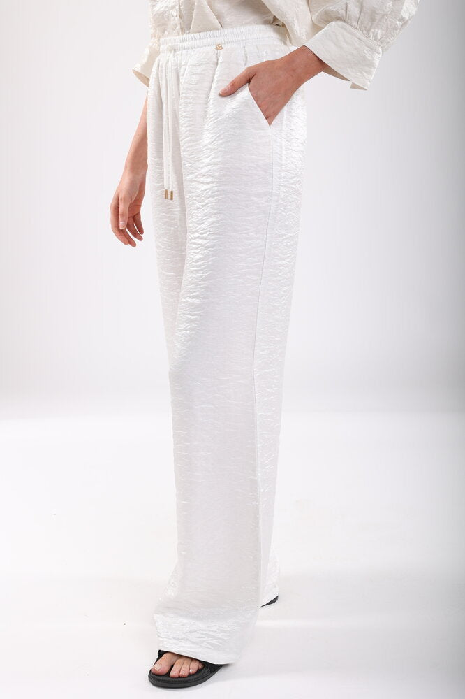 Pantalon nacré brillant avec élastique Vicenza Nukus