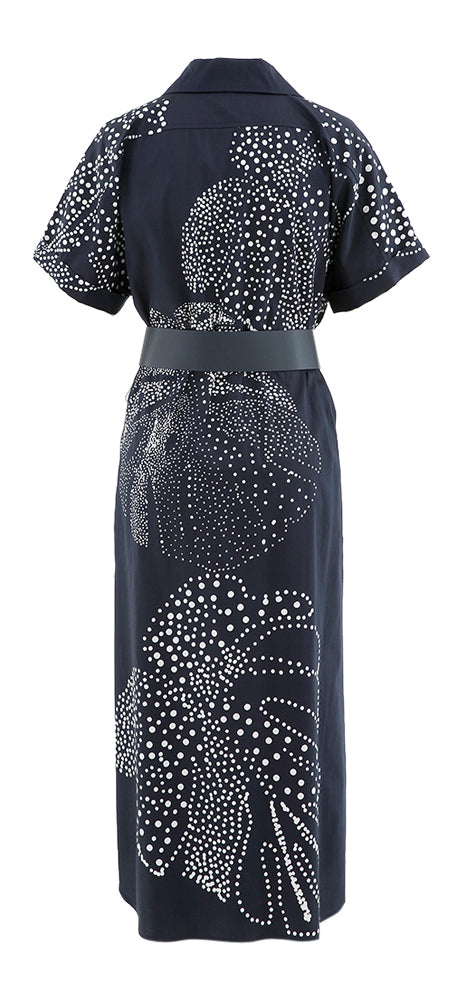Robe bleu foncé avec ceinture et motif à pois blancs Caroline Biss