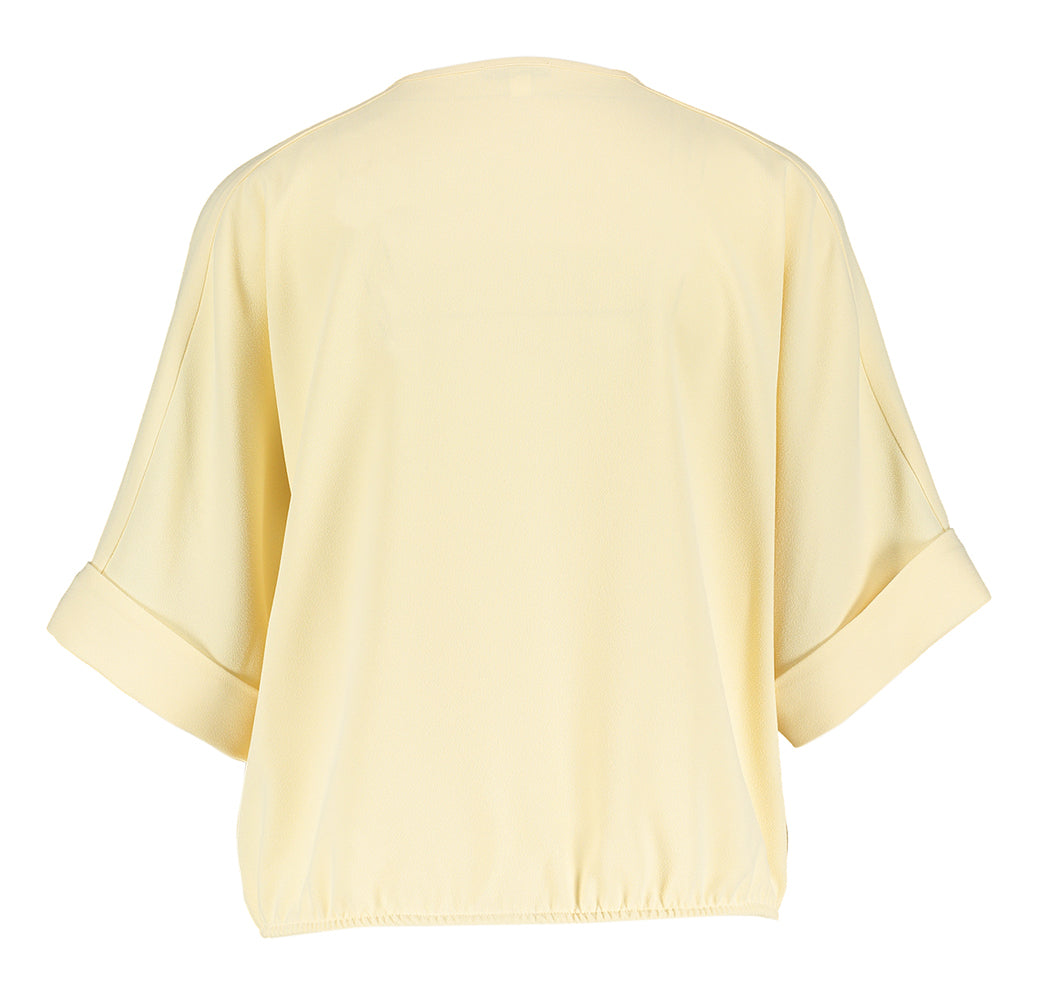 Chemisier couleur vanille avec boutons décoratifs dorés Caroline Biss