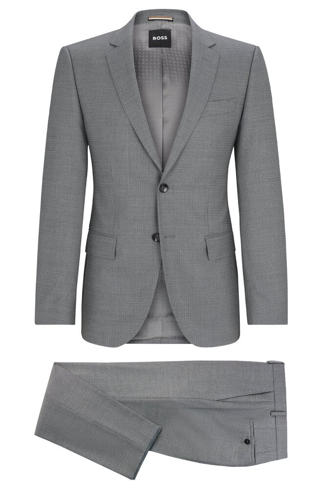 Costume deux pièces gris à motif discret, style Hugo Boss.