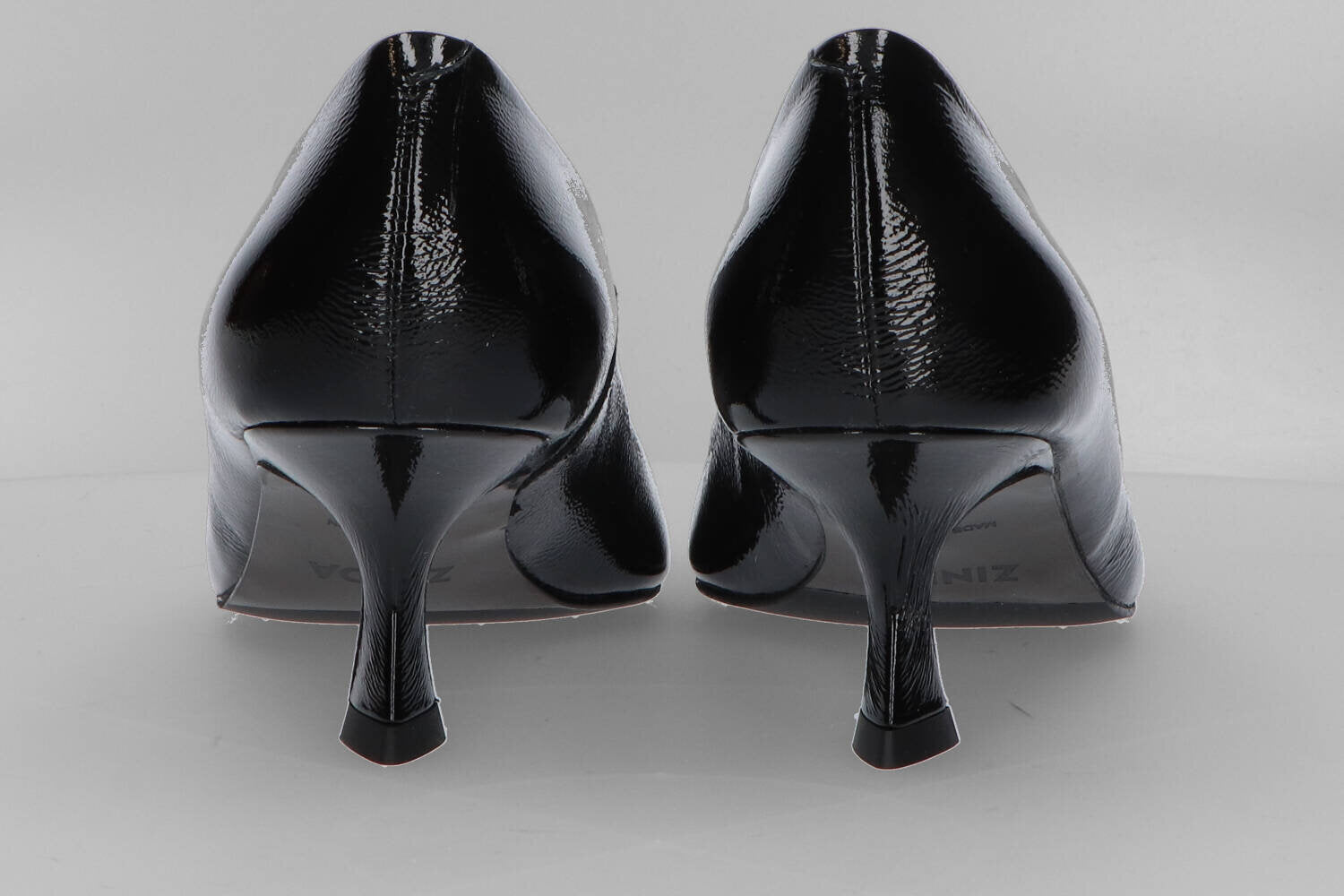 Naplak negro metallic pumps met trechterhak Zinda