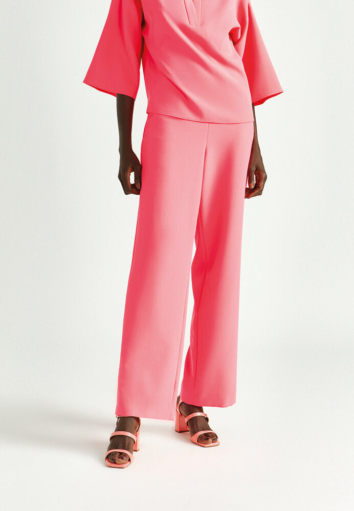 Fluo roze soepelvallende broek met elastiek Phocas Xandres