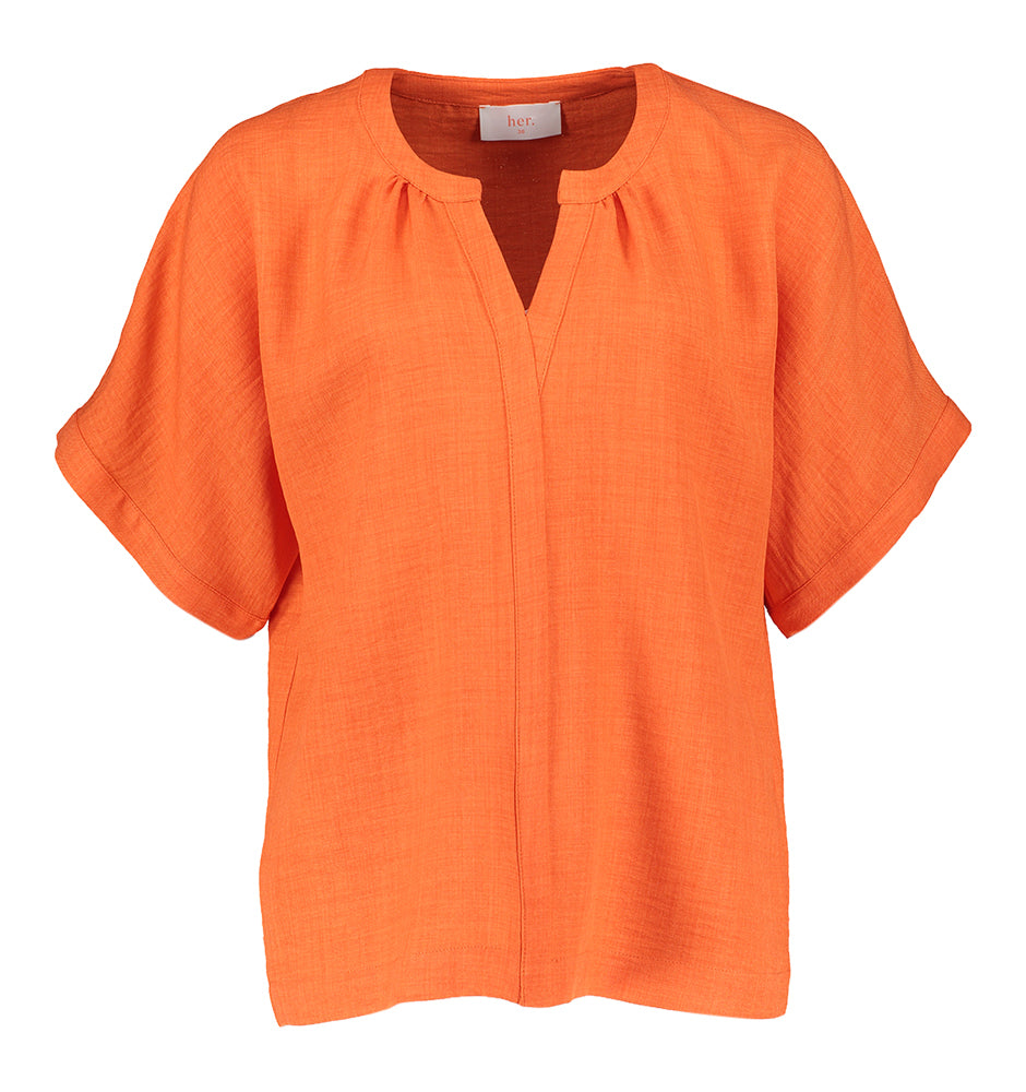 Chemisier rouge orangé à col montant et décolleté en V ELLE