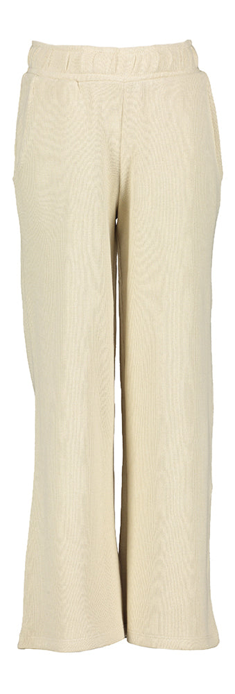 Pantalon-pull couleur sable en tissu côtelé. Nom