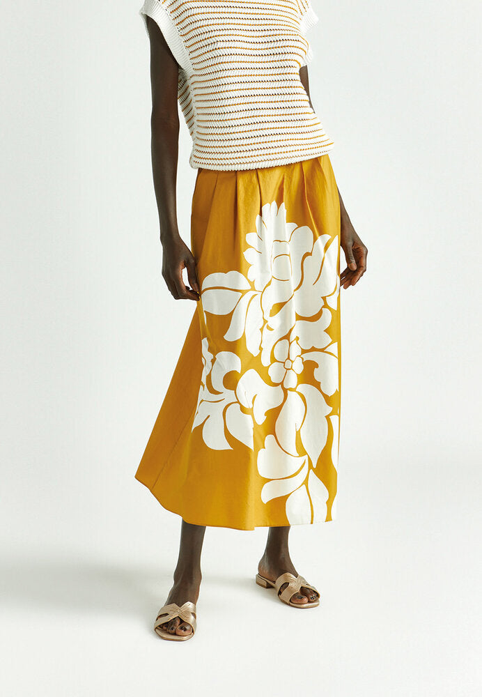 Jupe plissée jaune ocre à imprimé floral blanc Rila Xandres