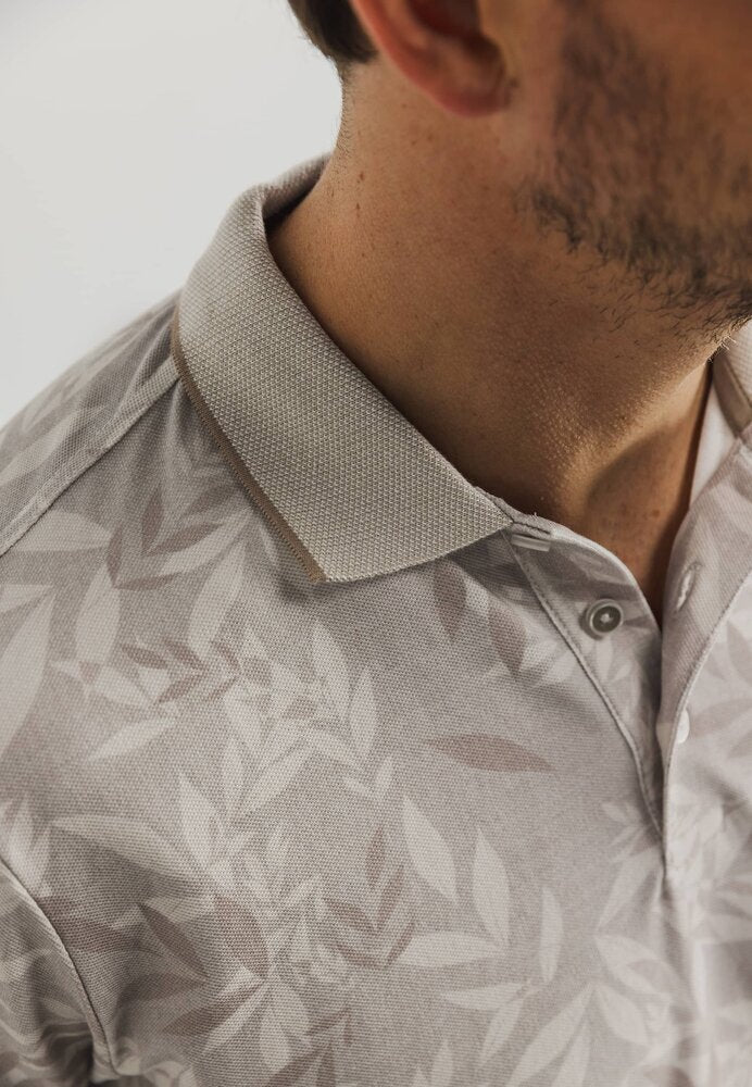 Polo beige avec imprimé de pointe