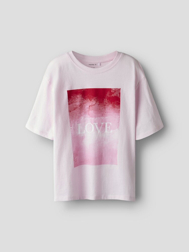 T-shirt rose clair en coton, col rond et manches courtes. Nomme-le