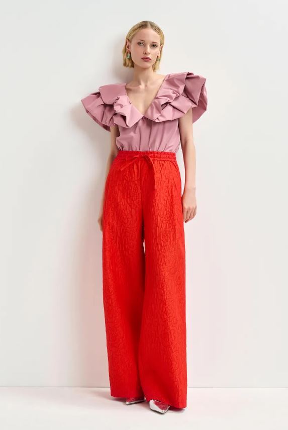 Gebrand roodoranje brede broek in bloemenjacquard Hone Essentiel