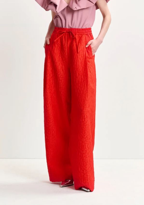 Pantalon large rouge orangé brûlé en jacquard floral Hone Essentiel