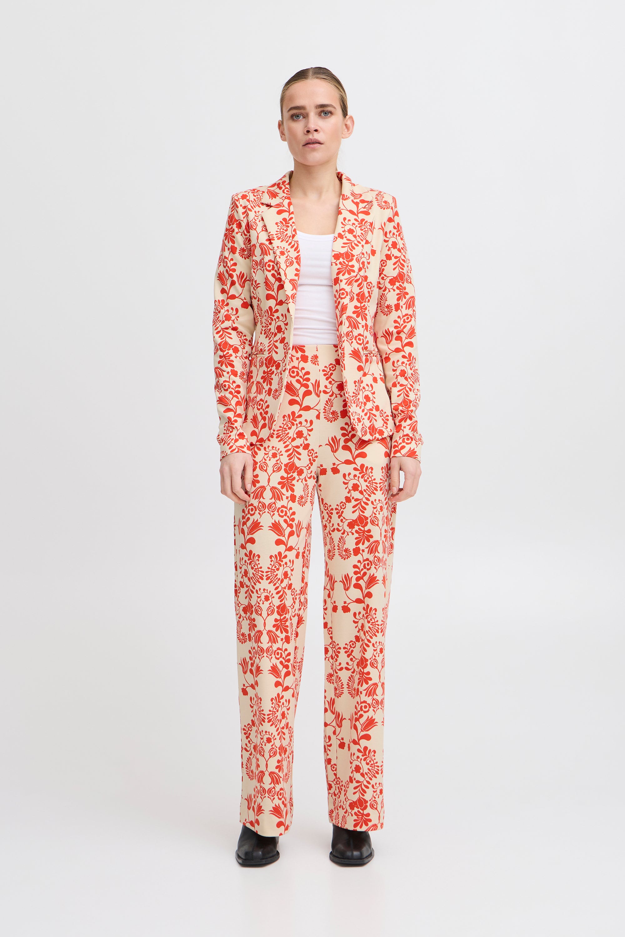 Pantalon beige à imprimé rouge Kate Ichi