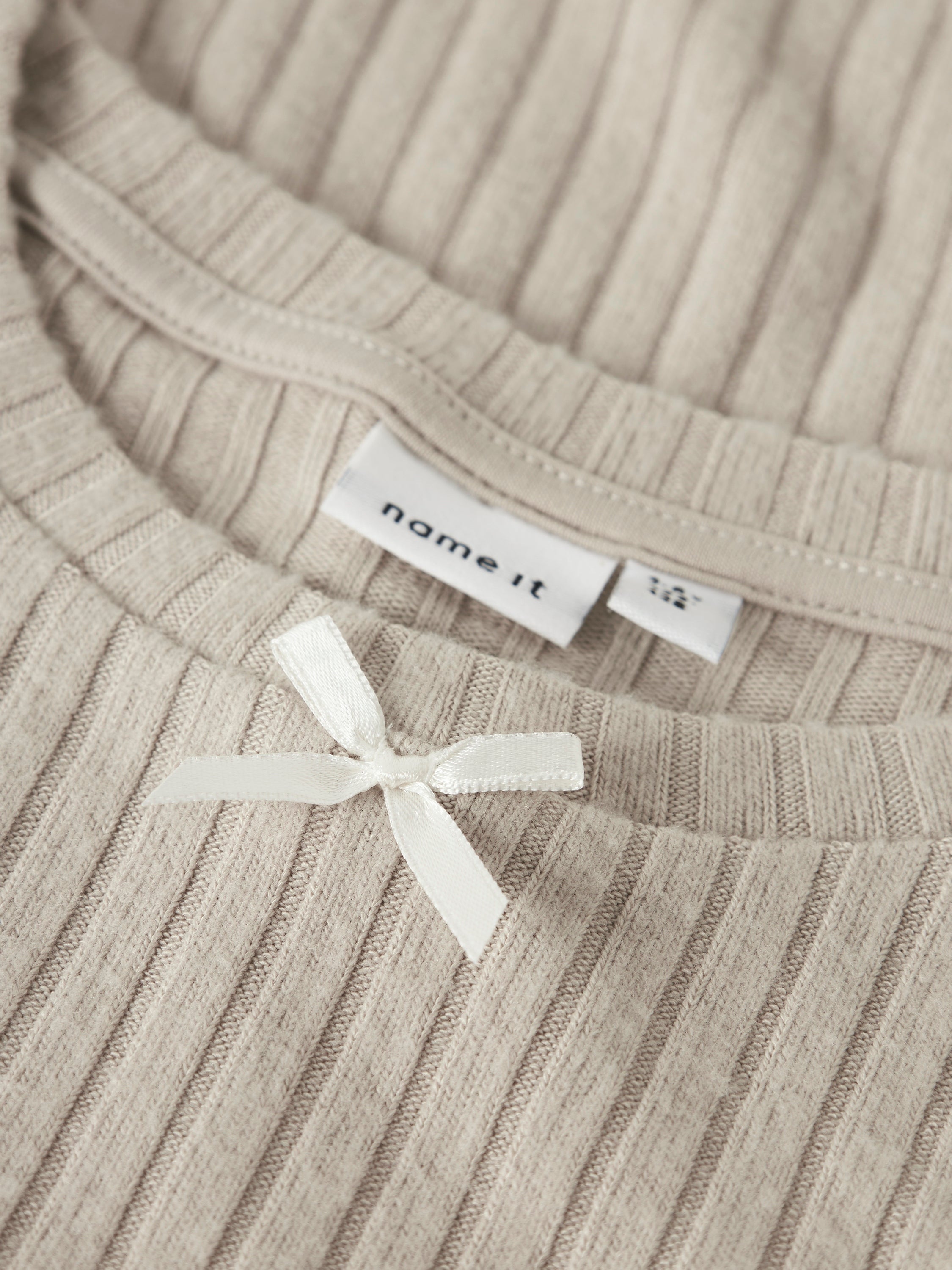 Beige pull in ribbel Name It