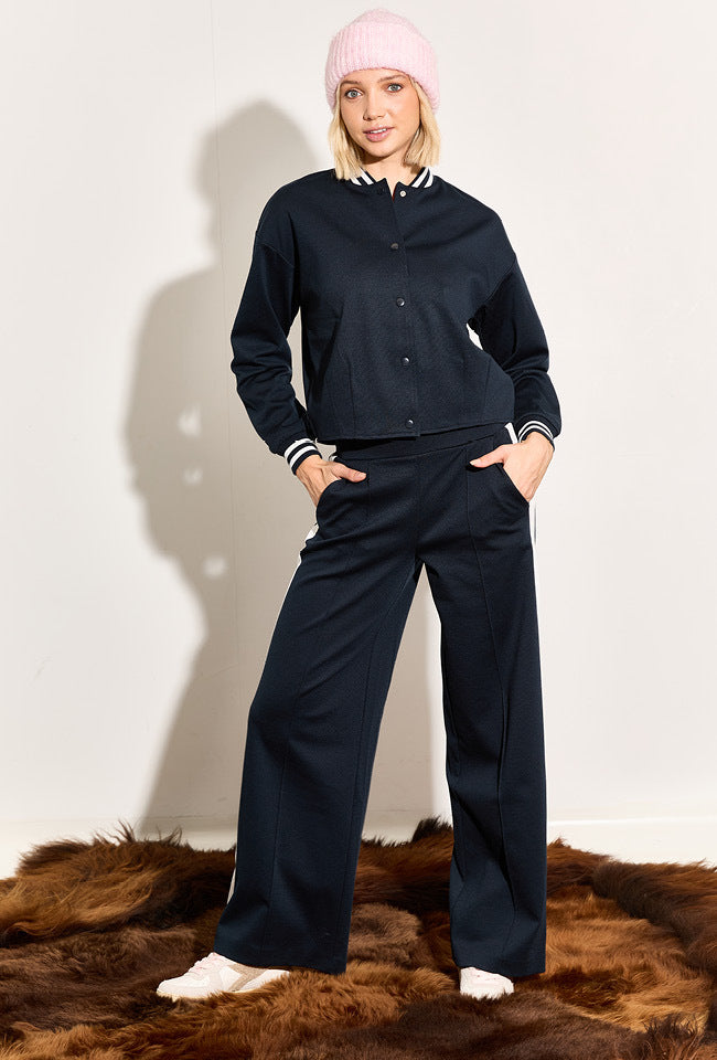 Donkerblauwe broek met wit zijdetail Kate Ichi